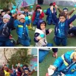 دانش‌آموزان در حال انجام فعالیت تیمی بیرونی سازمان‌یافته با پوشش رسمی بر روی زمین سبز
