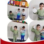 گروهی از کودکان ایستاده در کنار بنر رنگین، شهادت‌نامه و پروژه‌های دستی در دست دارند، در حال شرکت در یک رویداد و فعالیت گروهی مدرسه‌ای