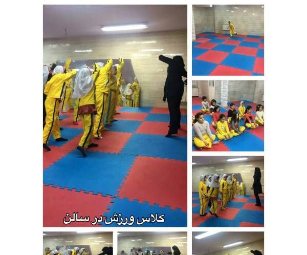 دانش‌آموزان در حال انجام تمارین ورزشی و فعالیت‌های فیزیکی در صالن‌ورزشی مدرسه با کفپوش قرمز و آبی، پوشش ورزشی زرد و مشکی